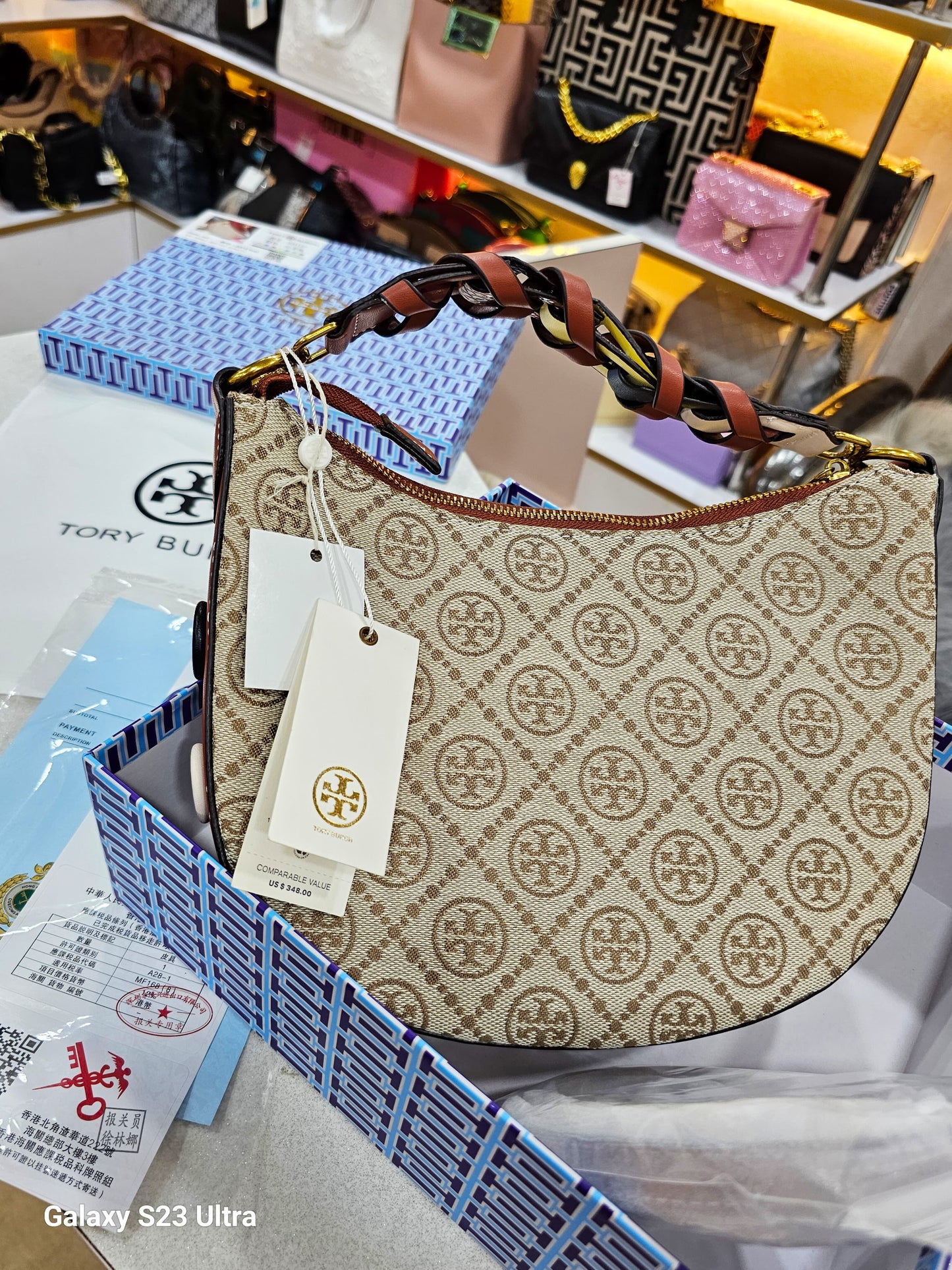 TORY BURCH CRESCENT BAG SWASTIK CREATIONS The Trend Point