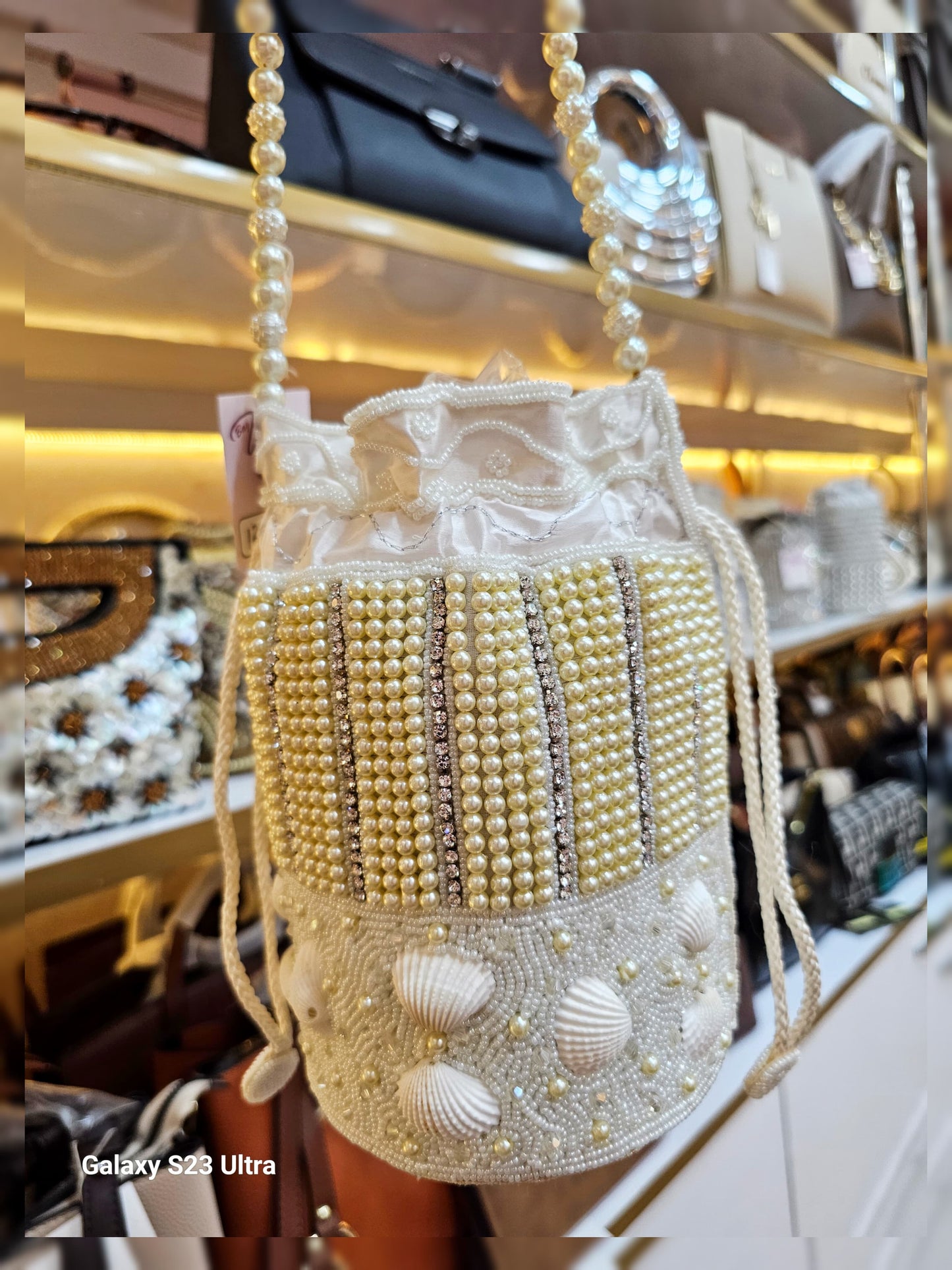 Ethnic Collection Premium Quality Potli Bag with Shell Work SWASTIK CREATIONS The Trend Point