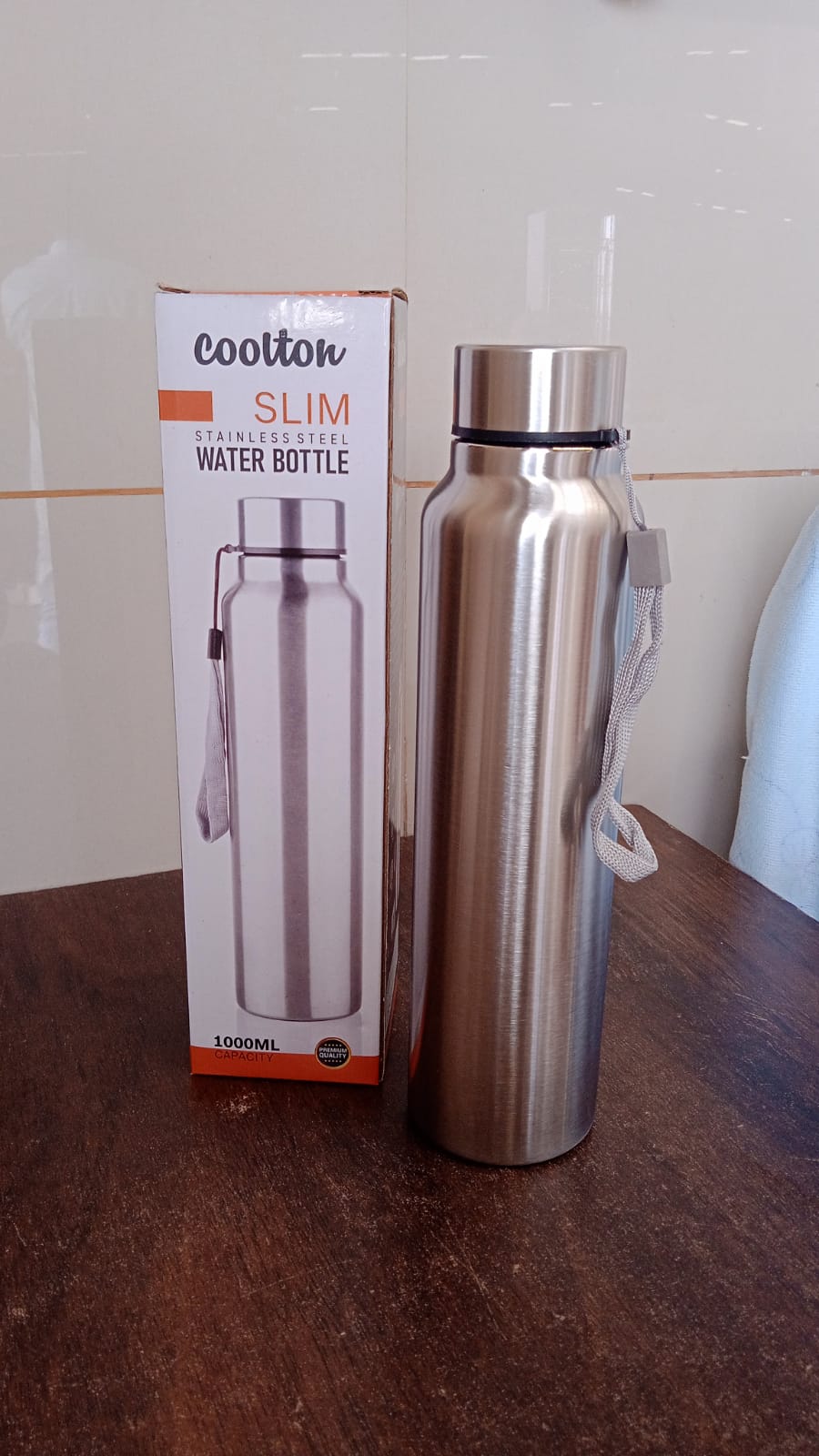 Stainless Steel Double Wall Vacuum-Insulated Drink Water Bottle (1000 ML) SWASTIK CREATIONS The Trend Point