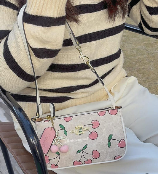 Coach Cherry Sling Bag