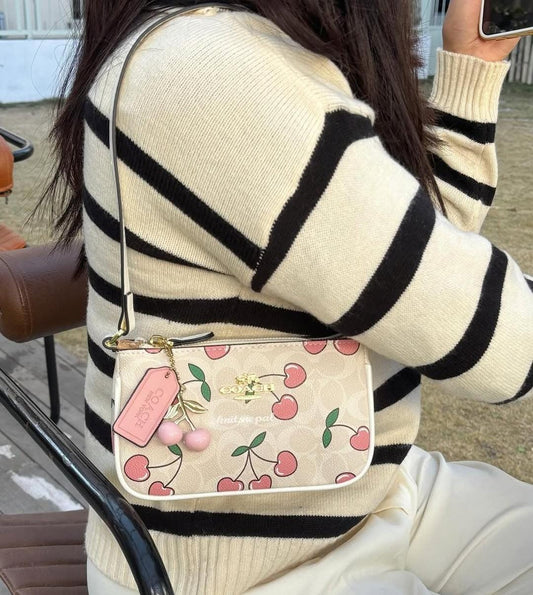 Coach Cherry Sling Bag