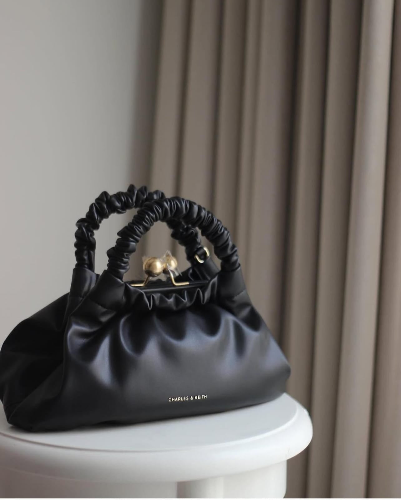 Charles and Keith Model - Eve Ruched - Handle Trapeze Premium Quality Bag SWASTIK CREATIONS The Trend Point