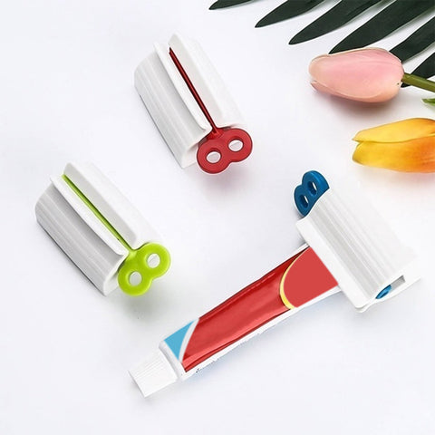 2514A Rolling Tube Toothpaste Squeezer Toothpaste Seat Holder Stand - SWASTIK CREATIONS The Trend Point